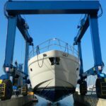 Luxury,Motor,Yacht,Lifted,By,A,Special,Crane,For,The